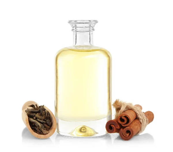 Tea oil with dry tea leaves — Stock Photo, Image