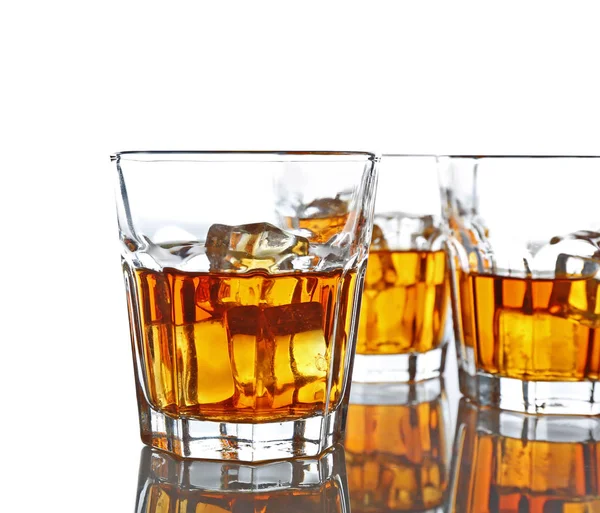 Glasses of whisky with ice — Stock Photo, Image