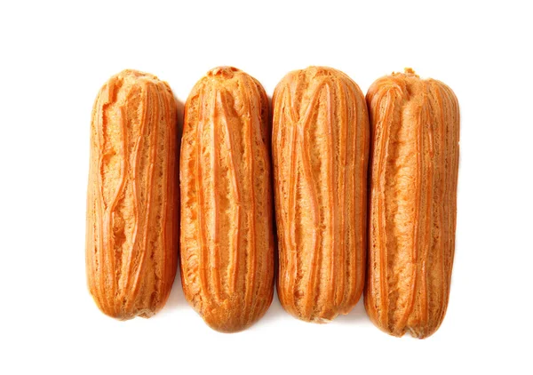 Deliziosi eclairs isolati su bianco — Foto Stock