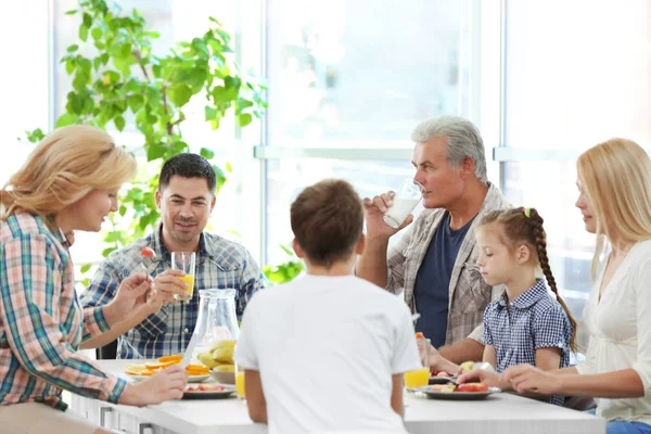 Happy large family having breakfast on kitchen — Stock Photo, Image