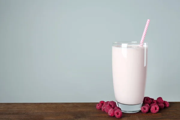 Glass of raspberries milkshake — Stock Photo, Image