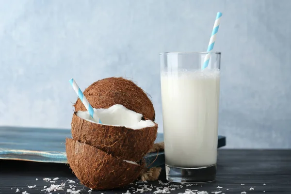 Tasty cocktail with coconut on table — Stock Photo, Image