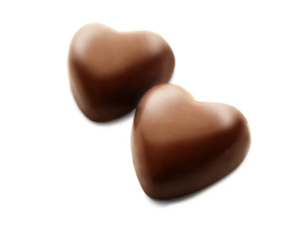 Chocolate hearts on white background — Stock Photo, Image