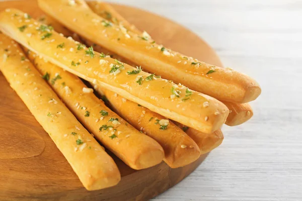 Garlic French bread on wooden board — Stock Image Garlic French bread on wooden board Royalty Free Stock Photos