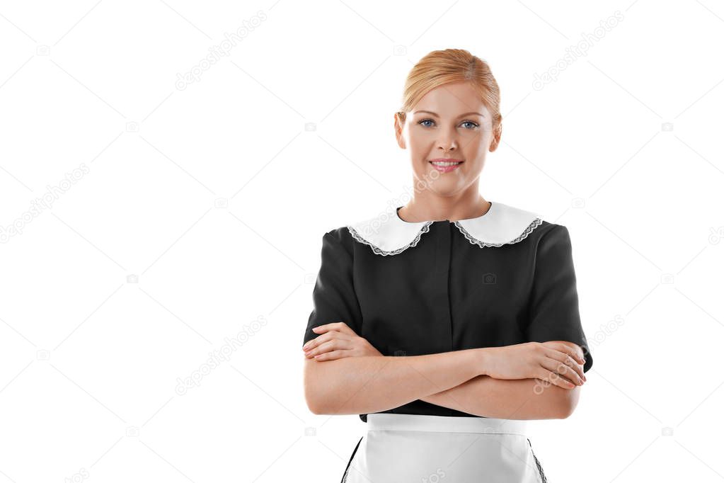 Portrait of beautiful chambermaid with crossed hands isolated on white
