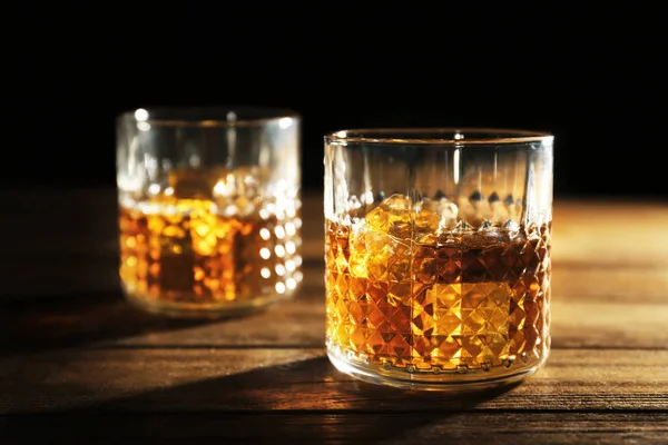 Glasses of whisky with ice — Stock Photo, Image