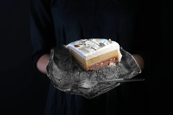 Woman holding tray — Stock Photo, Image