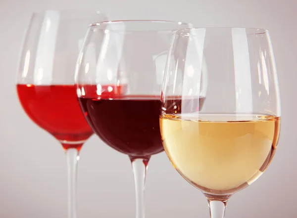 Three glasses with tasty wine — Stock Photo, Image