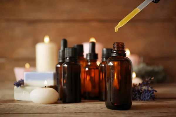 Pipette dropping essential oil — Stock Photo, Image