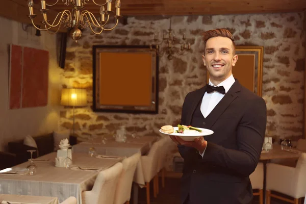 Handsome young waiter — Stock Photo, Image