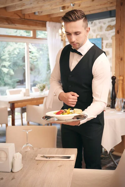 Handsome young waiter — Stock Photo, Image