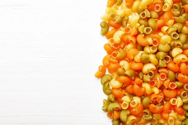 Raw pasta on table — Stock Photo, Image