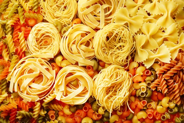 Raw pasta background — Stock Photo, Image