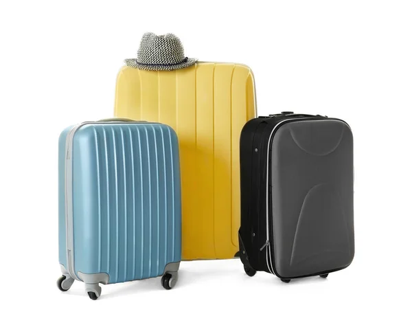 Modern suitcases and hat — Stock Photo, Image