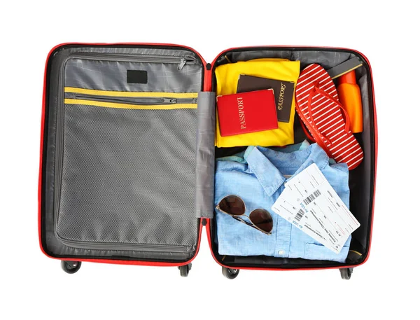 Open suitcase with traveller set — Stock Photo, Image