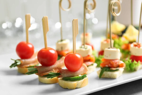 Assorted canapes on table — Stock Photo, Image
