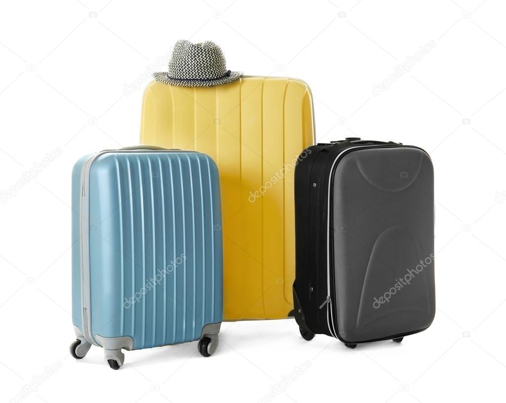 Modern suitcases and hat