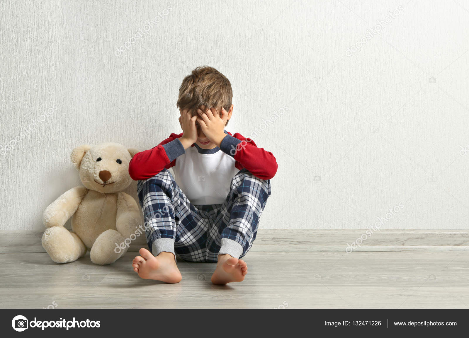 boy and teddy bear