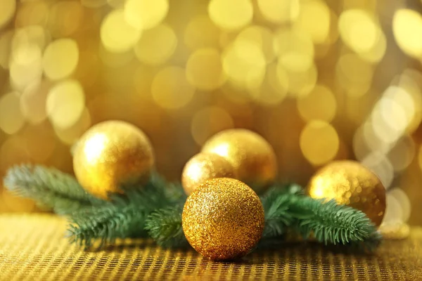 Baubles and coniferous branch — Stock Photo, Image