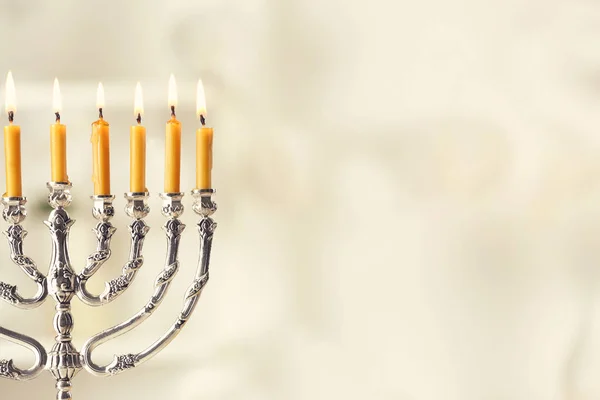 Beautiful menorah with burning candles — Stock Photo, Image