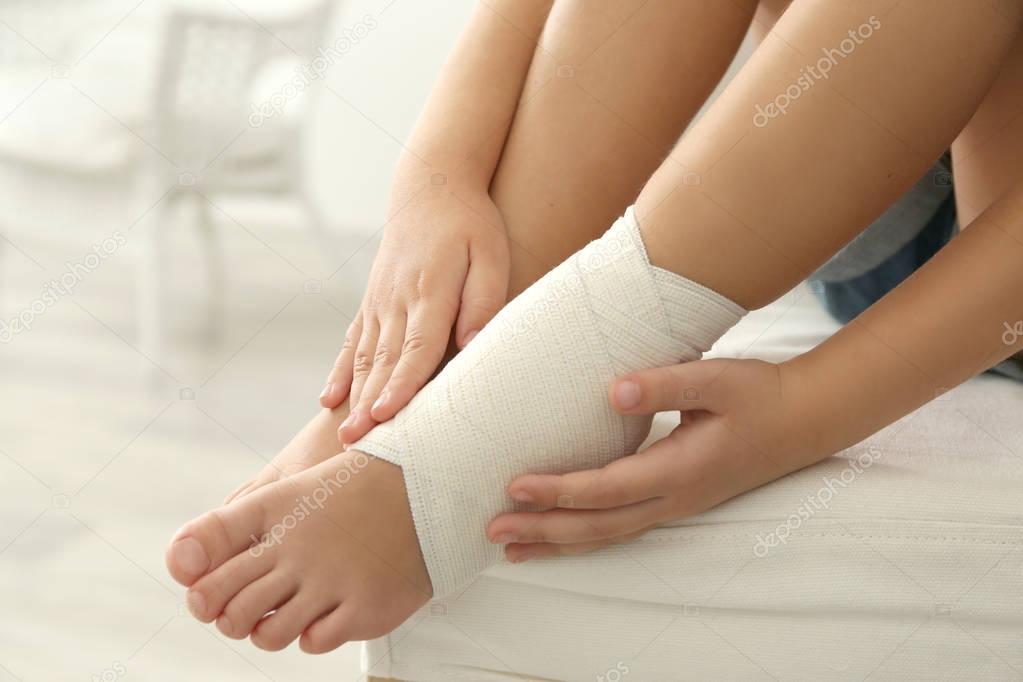 ankle with elastic bandage