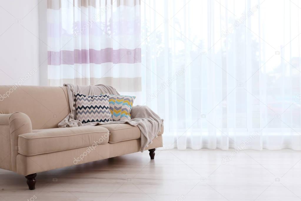  sofa on curtain background