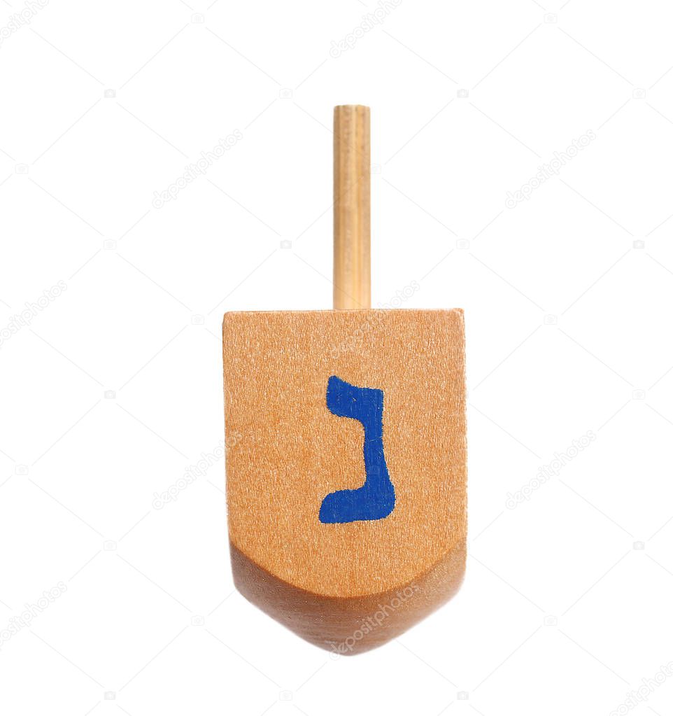 Wooden dreidel for Hanukkah 
