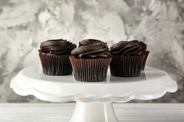 Tasty cupcakes on stand — Stock Photo, Image