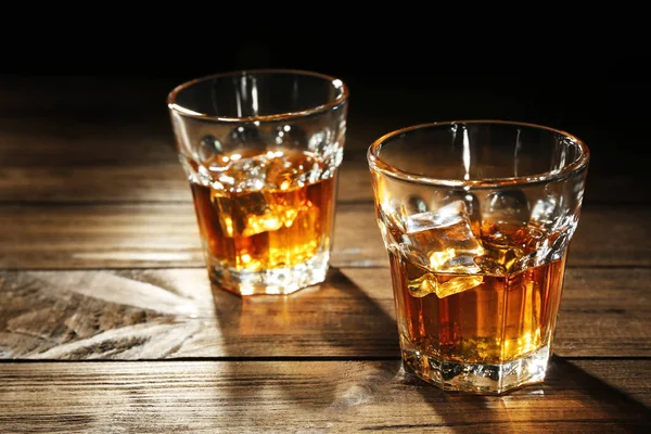 Glasses of whisky on table — Stock Photo, Image