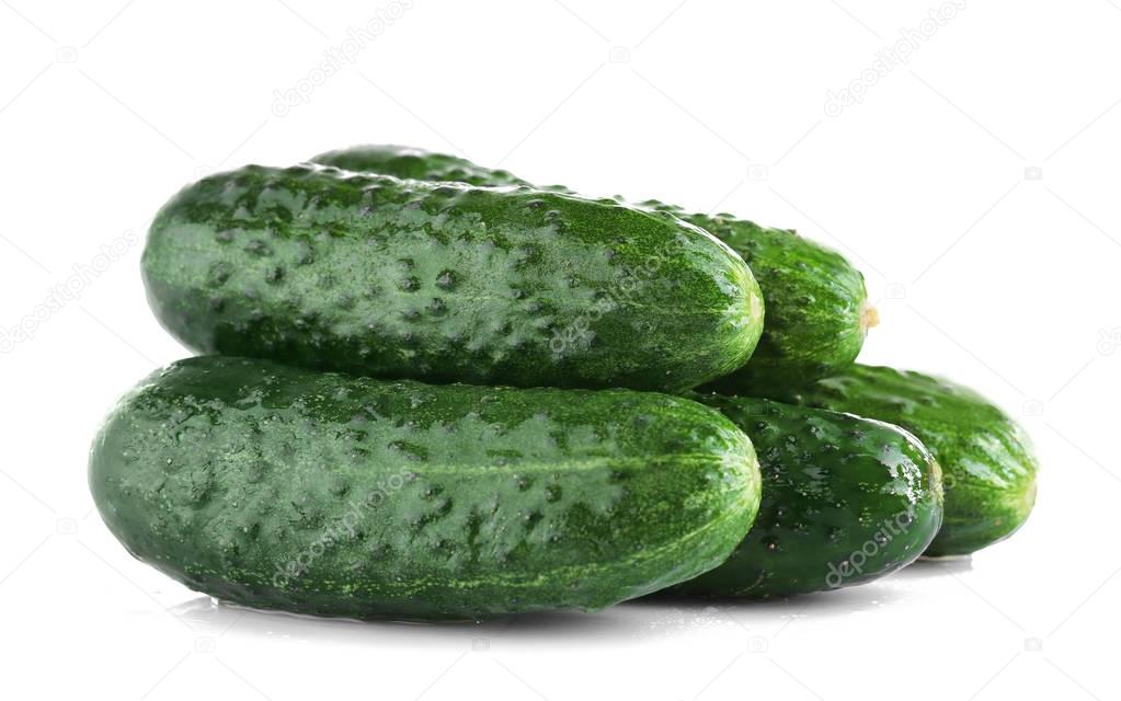 Fresh cucumbers  on white