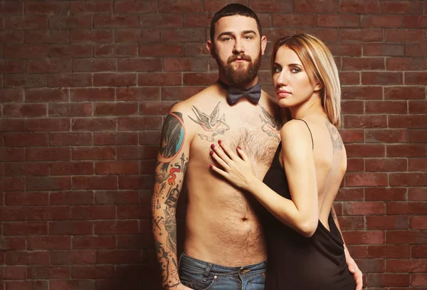Fashion tattooed  couple