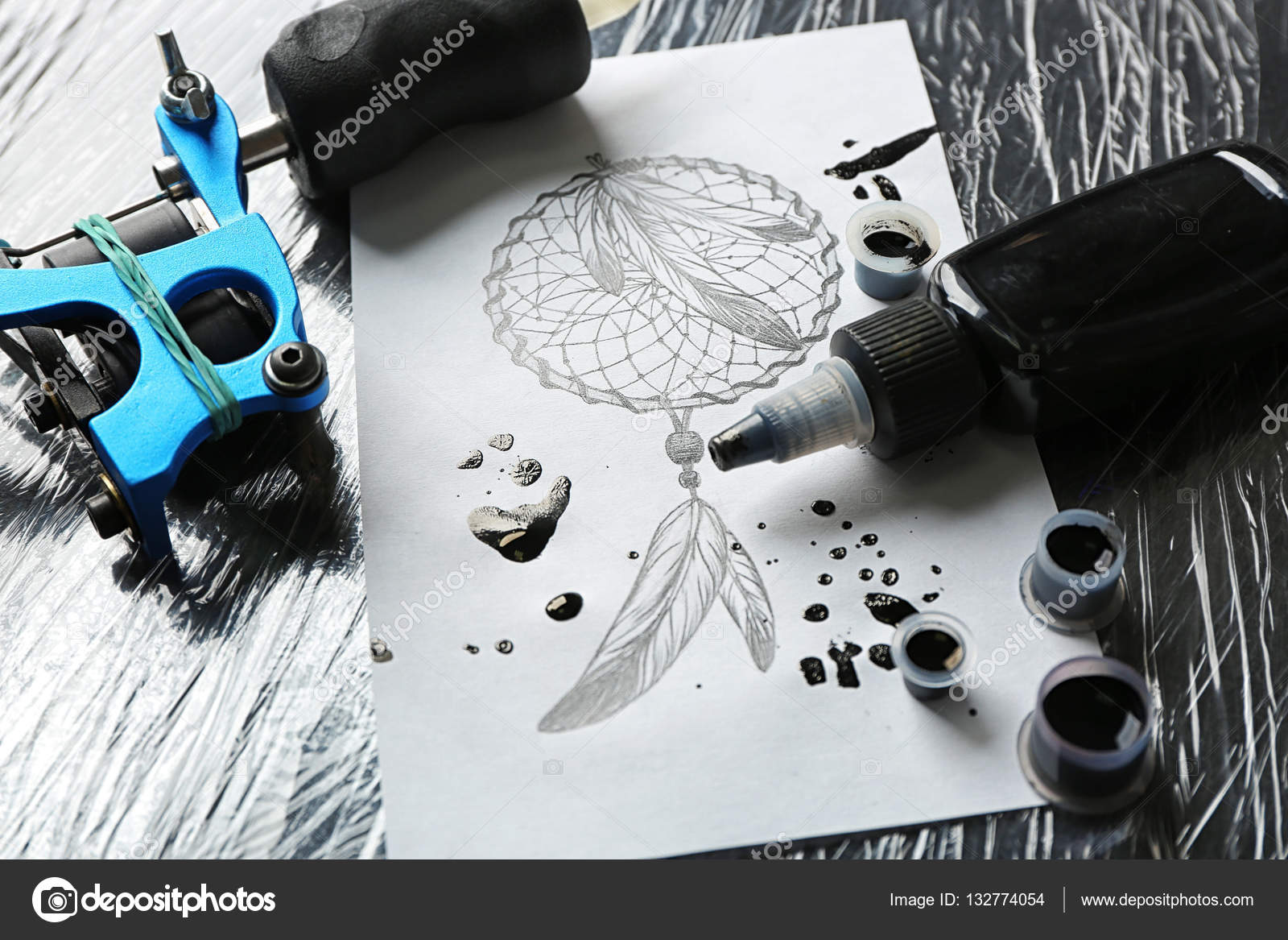Tattoo Machine Sketch Supplies Table Stock Photo by ©belchonock 132774054