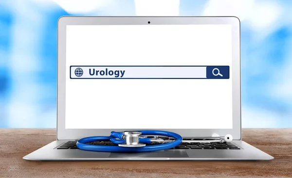 Modern laptop with word UROLOGY — Stock Photo, Image