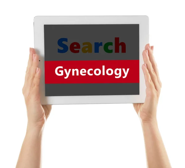 Händer som håller tablett med ordet gynekologi — Stockfoto