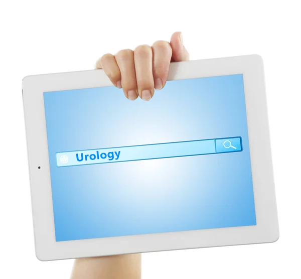 Hand holding tablet with word UROLOGY — Stock Photo, Image