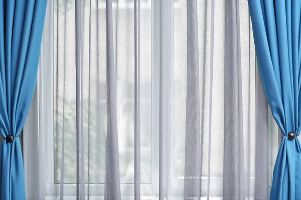 white and blue curtains