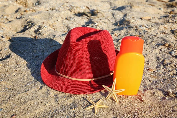 Red hat, sunscreen cream