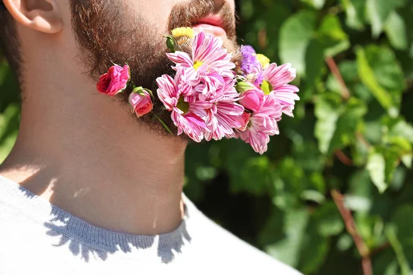 man with beard of flowers