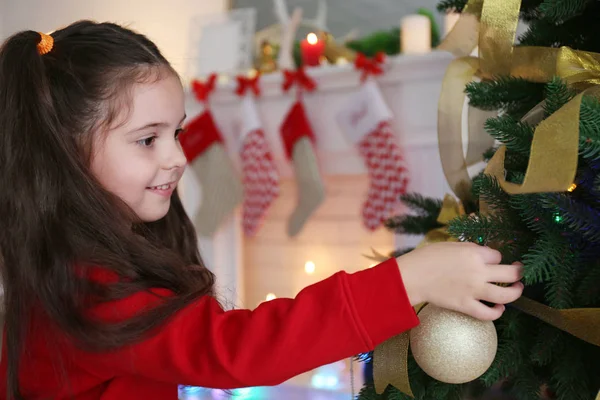 Little Girl Decorating Christmas Tree Blurred Background — Stock Photo, Image