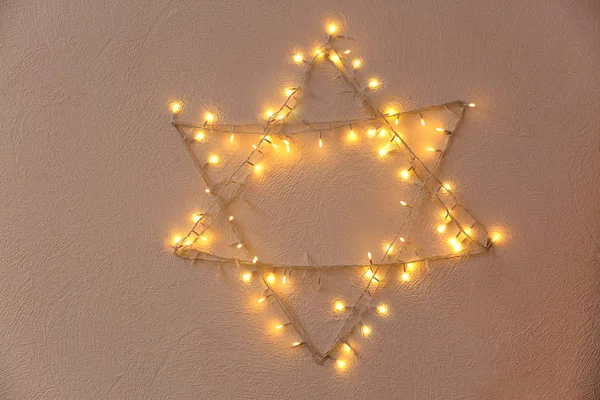 Star of David made from garland — Stock Photo, Image