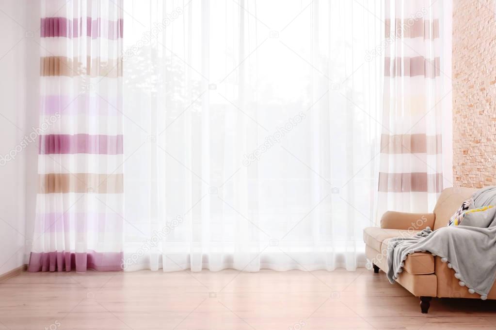 Window with elegant curtain