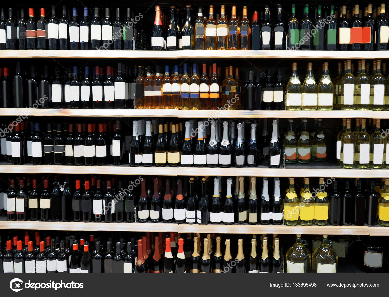 Shelves with alcohol bottles Stock Photo by ©belchonock 133695498