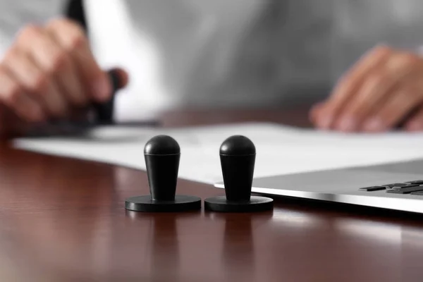 Stamps on notary public table — Stock Photo, Image