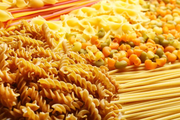 Raw pasta background — Stock Photo, Image