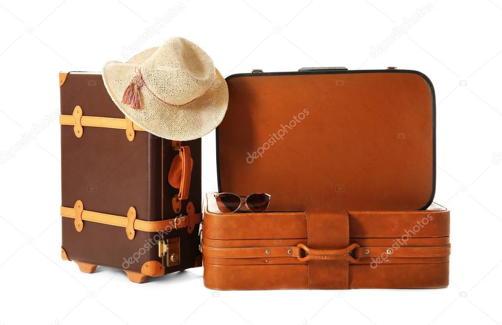 Modern suitcases and hat