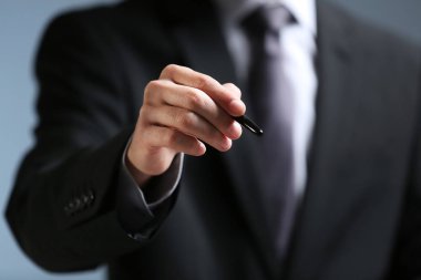 Businessman hand pointing
