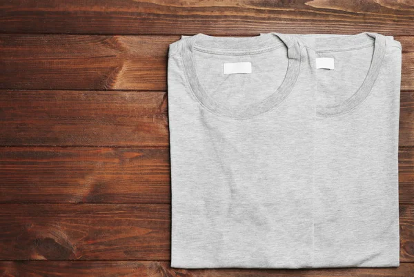 Blank light grey t-shirts — Stock Photo, Image
