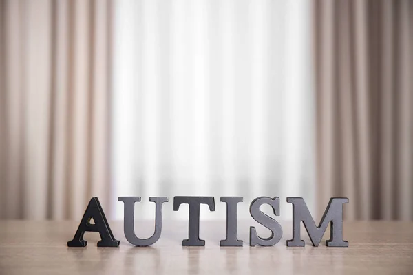 Wooden word AUTISM — Stock Photo, Image