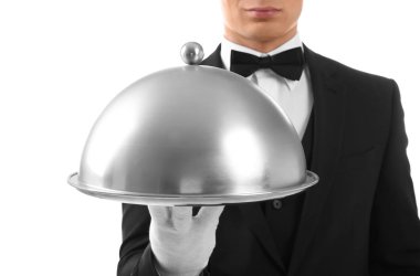 Male waiter holding cloche and tray clipart