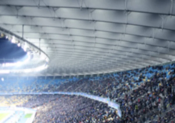 Fans titta på fotbollsmatch på stadion — Stockfoto